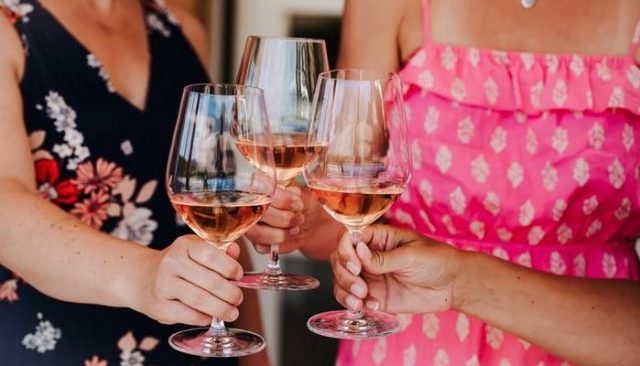ladies drinking rose wine